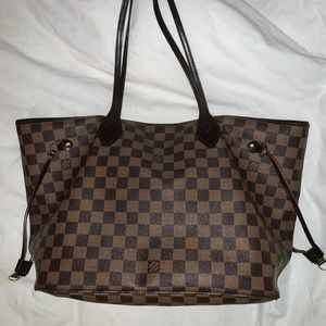 Authentic LOUIS VUITTON never full bag